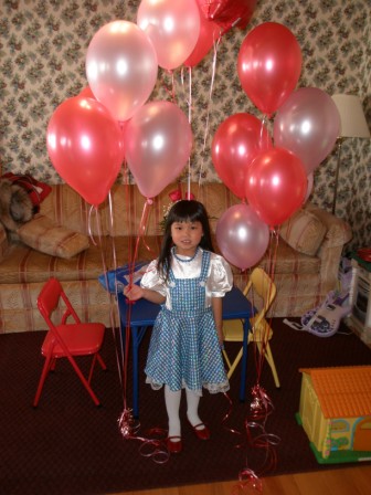 Kasen with birthday balloons